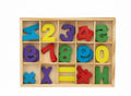 Wooden numbers and math symbols / أرقام خشبية ورموز رياضية